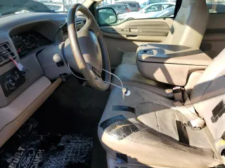 1999 Ford F-250 XL with VIN 1FTNX21L7XED97757, listed as a Copart auction lot 42296985 with 168,728 mi miles and Salvage title. Bid and sale history available at DreamBid. Image 7.