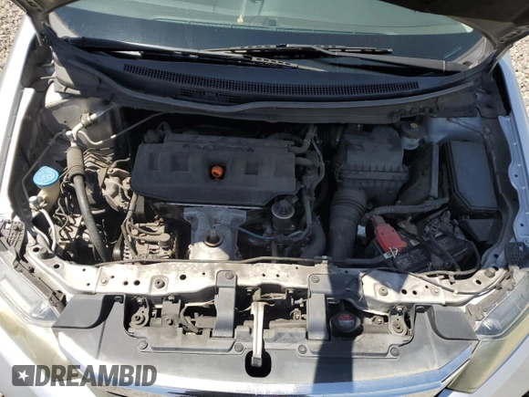 2012 Honda Civic LX z VIN 19XFB2F53CE373385, wystawiony jako Copart lot #51335755 z przebiegiem 188 159 mil mil oraz Szkoda całkowita • Salvage title. Historia ofert i sprzedaży dostępna na DreamBid. Obrazek 11.
