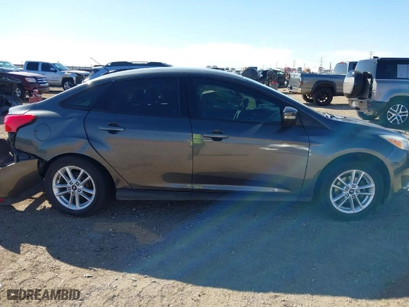 2016 Ford Focus SE with VIN 1FADP3F25GL340749, listed as a IAAI auction lot 41777374 with 67,573 mi miles. Bid and sale history available at carsss.com. Image 13.