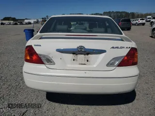 2002 Toyota Avalon XL z VIN 4T1BF28BX2U250961, wystawiony jako Copart lot #50400245 z przebiegiem 351 091 mil mil oraz Szkoda całkowita • Salvage title. Historia ofert i sprzedaży dostępna na DreamBid. Obrazek 6.