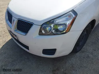 2010 Pontiac Vibe w/1SA with VIN 5Y2SP6E89AZ415272, listed as a IAAI auction lot 42036389 with 236,767 mi miles. Bid and sale history available at carsss.com. Image 6.