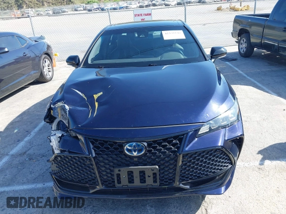 2021 Toyota Avalon Hybrid XSE z VIN 4T1EA1AB3MU005275, wystawiony jako IAAI lot #42335546 z przebiegiem 46 524 mil mil oraz . Historia ofert i sprzedaży dostępna na DreamBid. Obrazek 12.