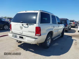 2006 Cadillac Escalade z VIN 1GYEK63NX6R109252, wystawiony jako IAAI lot #41755712 z przebiegiem 188 864 mil mil oraz . Historia ofert i sprzedaży dostępna na DreamBid. Obrazek 4.
