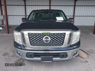 2018 Nissan Titan SV with VIN 1N6AA1E63JN512230, listed as a IAAI auction lot 42000705 with 64,479 mi miles and . Bid and sale history available at DreamBid. Image 12.