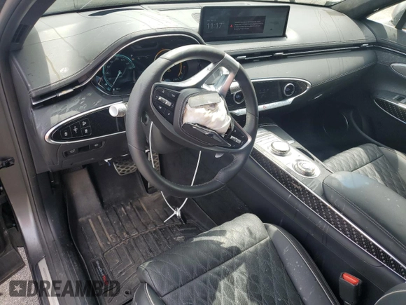 2024 Genesis GV70 Sport z VIN 5NMMCDTC8RH004817, wystawiony jako Copart lot #58254995 z przebiegiem 27 557 mil mil oraz Szkoda całkowita • Salvage title. Historia ofert i sprzedaży dostępna na DreamBid. Obrazek 8.