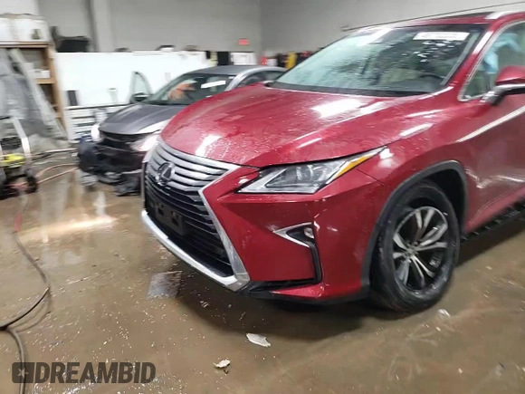 2017 Lexus RX 350 z VIN 2T2BZMCA4HC084282, wystawiony jako Copart lot #49782835 z przebiegiem 70 641 mil mil oraz Szkoda całkowita • Salvage title. Historia ofert i sprzedaży dostępna na DreamBid. Obrazek 13.