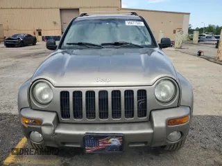 2004 Jeep Liberty Limited z VIN 1J4GL58K64W298687, wystawiony jako Copart lot #56677595 z przebiegiem 180 825 mil mil oraz Szkoda całkowita • Salvage title. Historia ofert i sprzedaży dostępna na DreamBid. Obrazek 5.