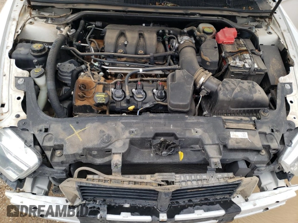 2013 Ford Taurus Limited с VIN 1FAHP2F88DG159651, выставлен на аукционе Copart как лот 55624985 с пробегом 113 878 миль миль и Списание • Salvage title. История ставок и продаж доступна на DreamBid. Изображение 11.