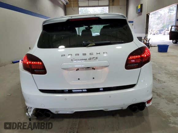 2013 Porsche Cayenne GTS with VIN WP1AD2A24DLA76344, listed as a Copart auction lot 83570884 with 63,704 mi miles and Salvage title. Bid and sale history available at DreamBid. Image 6.