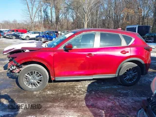 2017 Mazda CX-5 Touring with VIN JM3KFBCL1H0227290, listed as a IAAI auction lot 41400188 with 58,801 mi miles. Bid and sale history available at carsss.com. Image 14.