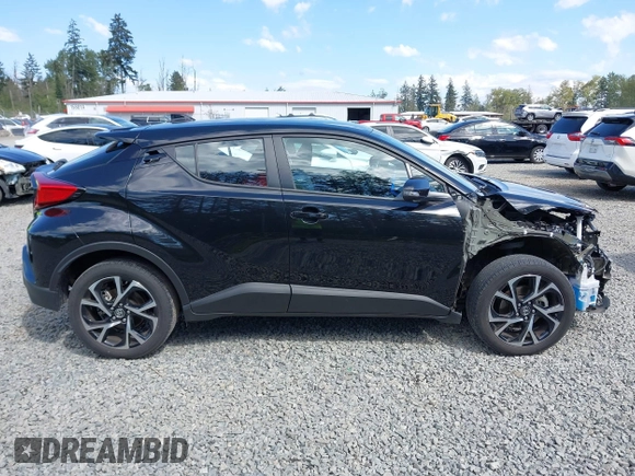 2021 Toyota C-HR LE with VIN NMTKHMBX3MR139981, listed as a IAAI auction lot 42188321 with 22,852 mi miles and . Bid and sale history available at DreamBid. Image 14.