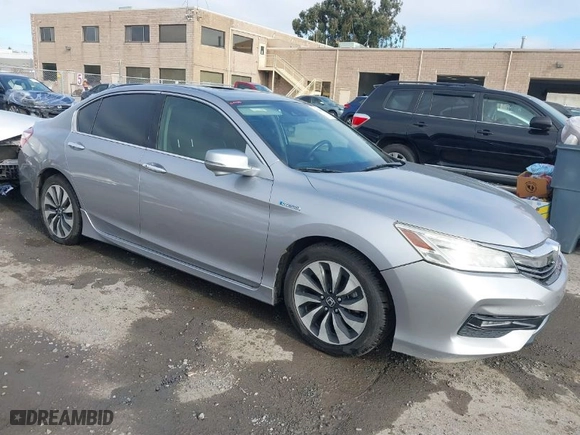 2017 Honda Accord Hybrid Touring with VIN JHMCR6F7XHC006357, listed as a IAAI auction lot 41263478 with 118,758 mi miles. Bid and sale history available at carsss.com. Image 1.
