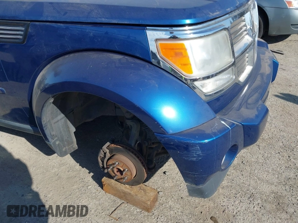 2010 Dodge Nitro SE with VIN 1D4PT2GK4AW141616, listed as a IAAI auction lot 42183953 with 128,023 mi miles. Bid and sale history available at carsss.com. Image 6.