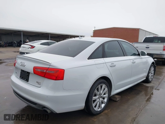 2015 Audi A6 Premium Plus z VIN WAUFGAFC4FN024260, wystawiony jako IAAI lot #41602618 z przebiegiem 159 099 mil mil oraz . Historia ofert i sprzedaży dostępna na DreamBid. Obrazek 4.