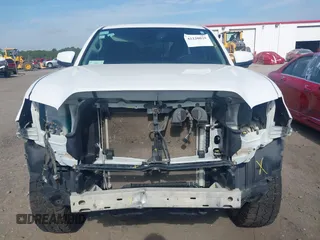 2023 Toyota Tacoma SR with VIN 3TYCZ5AN2PT112854, listed as a IAAI auction lot 42220025 with 43,657 mi miles and . Bid and sale history available at DreamBid. Image 13.