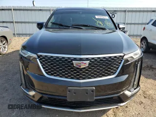 2020 Cadillac XT6 FWD Premium Luxury с VIN 1GYKPCRSXLZ174002, выставлен на аукционе Copart как лот 52083235 с пробегом 79 712 миль миль и Списание • Salvage title. История ставок и продаж доступна на DreamBid. Изображение 5.