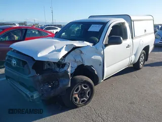 2014 Toyota Tacoma with VIN 5TFNX4CN6EX032823, listed as a IAAI auction lot 41711243 with 141,201 mi miles and . Bid and sale history available at DreamBid. Image 2.