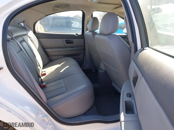 2004 Mercury Sable LS Premium with VIN 1MEHM55S64G610527, listed as a IAAI auction lot 41739433 with 34,409 mi miles. Bid and sale history available at carsss.com. Image 8.