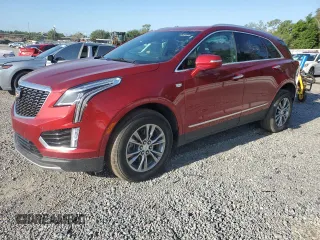 2023 Cadillac XT5 AWD Premium Luxury z VIN 1GYKNDRS5PZ142799, wystawiony jako Copart lot #56870265 z przebiegiem 22 585 mil mil oraz Szkoda całkowita • Salvage title. Historia ofert i sprzedaży dostępna na DreamBid. Obrazek 1.