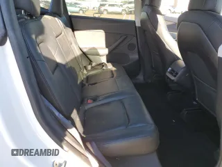 2020 Tesla Model Y Long Range with VIN 5YJYGDEE4LF015455, listed as a Copart auction lot 84223984 with 77,398 mi miles and Salvage Title. Bid and sale history available at DreamBid. Image 10.