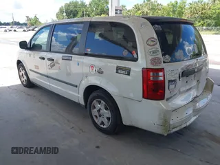 2008 Dodge Grand Caravan SE with VIN 1D8HN44H98B126418, listed as a IAAI auction lot 42223290 with 317,457 mi miles and . Bid and sale history available at DreamBid. Image 3.