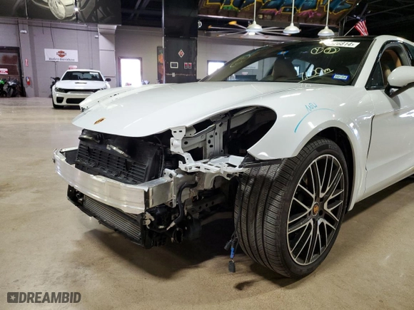 2022 Porsche Panamera with VIN WP0AJ2A75NL102179, listed as a Copart auction lot 58626814 with 7,100 mi miles and Salvage Title. Bid and sale history available at carsss.com. Image 9.