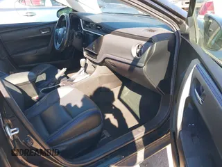 2019 Toyota Corolla L z VIN 5YFBURHE7KP857880, wystawiony jako IAAI lot #41850987 z przebiegiem 117 823 mil mil oraz . Historia ofert i sprzedaży dostępna na DreamBid. Obrazek 5.