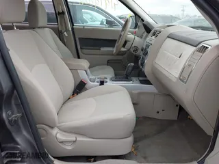 2009 Mercury Mariner with VIN 4M2CU91G49KJ05721, listed as a IAAI auction lot 41919006 with 105,537 mi miles. Bid and sale history available at carsss.com. Image 5.