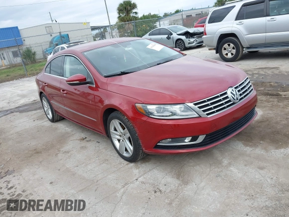 2014 Volkswagen CC Sport with VIN WVWBN7AN0EE527558, listed as a IAAI auction lot 41336204 with 130,005 mi miles and . Bid and sale history available at DreamBid. Image 1.