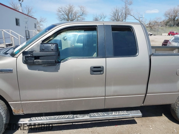 2005 Ford F-150 XLT with VIN 1FTPX14525NA78019, listed as a IAAI auction lot 41932381 with 170,153 mi miles. Bid and sale history available at carsss.com. Image 14.