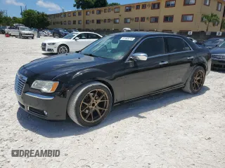 2014 Chrysler 300 C с VIN 2C3CCAKT2EH142116, выставлен на аукционе Copart как лот 61469715 с пробегом 137 588 миль миль и Чистый • Clean title. История ставок и продаж доступна на DreamBid. Изображение 1.