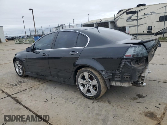 2009 Pontiac G8 GT with VIN 6G2EC57Y09L189449, listed as a Copart auction lot 85825704 with 82,596 mi miles and Salvage Title. Bid and sale history available at carsss.com. Image 2.