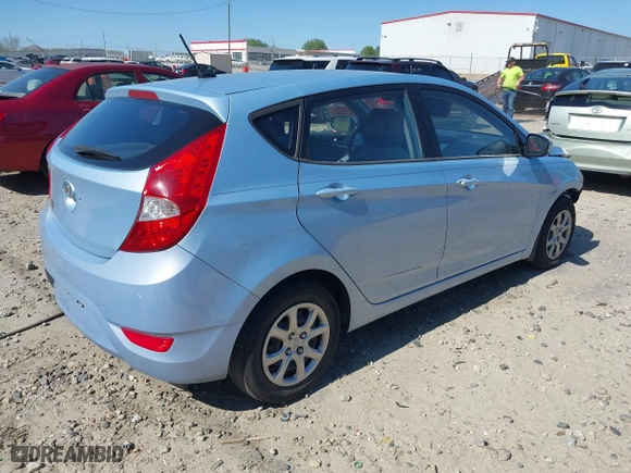 2014 Hyundai Accent GS with VIN KMHCT5AE1EU187112, listed as a IAAI auction lot 41894869 with 100,640 mi miles. Bid and sale history available at carsss.com. Image 4.