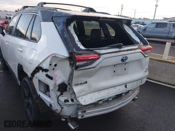 2021 Toyota RAV4 Hybrid XSE with VIN 4T3E6RFV8MU056524, listed as a IAAI auction lot 41788452 with 56,751 mi miles. Bid and sale history available at carsss.com. Image 6.