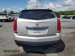 2014 Cadillac SRX Luxury Collection z VIN 3GYFNEE37ES630832, wystawiony jako Copart lot #56335035 z przebiegiem 102 076 mil mil oraz Szkody całkowita. Historia ofert i sprzedaży dostępna na DreamBid. Obrazek 6.