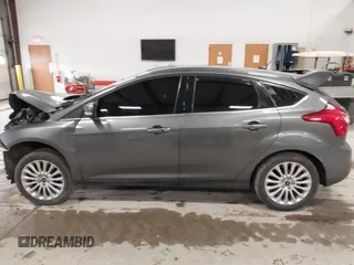 2012 Ford Focus Titanium with VIN 1FAHP3N27CL313288, listed as a IAAI auction lot 41741895 with 140,376 mi miles and . Bid and sale history available at carsss.com. Image 15.