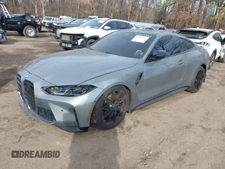 2022 BMW M4 Competition xDrive with VIN WBS43AZ06NCH93498, listed as a IAAI auction lot 41563322 with 10,449 mi miles. Bid and sale history available at carsss.com. Image 2.