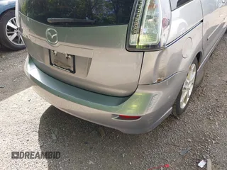 2010 Mazda 5 Sport with VIN JM1CR2W31A0384307, listed as a IAAI auction lot 42305589 with 144,372 mi miles and . Bid and sale history available at DreamBid. Image 12.