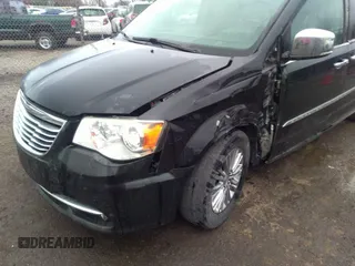 2015 Chrysler Town & Country Touring L with VIN 2C4RC1CG7FR539937, listed as a IAAI auction lot 41817807 with 158,400 mi miles and . Bid and sale history available at carsss.com. Image 6.