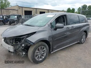 2021 Toyota Sienna LE with VIN 5TDKRKEC9MS034194, listed as a IAAI auction lot 42552990 with 21,633 mi miles and . Bid and sale history available at DreamBid. Image 2.