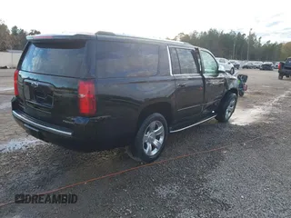 2020 Chevrolet Suburban Premier with VIN 1GNSCJKC0LR121728, listed as a IAAI auction lot 41105003 with 43,820 mi miles and . Bid and sale history available at DreamBid. Image 4.