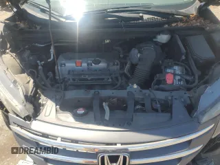 2013 Honda CR-V EX-L z VIN 2HKRM4H7XDH628094, wystawiony jako Copart lot #57358245 z przebiegiem 123 505 mil mil oraz Szkody całkowita. Historia ofert i sprzedaży dostępna na DreamBid. Obrazek 12.