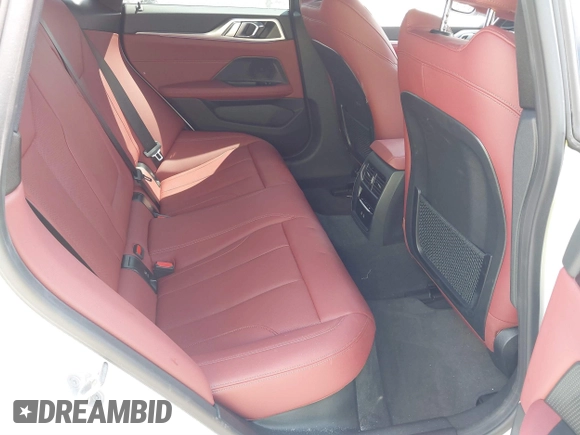 2024 BMW i4 eDrive35 z VIN WBY43AW02RFR51721, wystawiony jako IAAI lot #40336142 z przebiegiem 20 090 mil mil oraz . Historia ofert i sprzedaży dostępna na DreamBid. Obrazek 8.