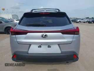 2023 Lexus UX 250h Premium z VIN JTHP6JBH5P2145912, wystawiony jako IAAI lot #42401353 z przebiegiem 14 252 mil mil oraz . Historia ofert i sprzedaży dostępna na DreamBid. Obrazek 16.