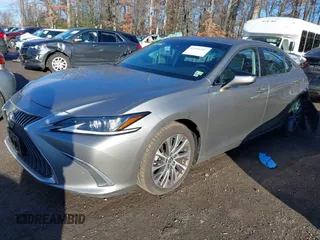 2020 Lexus ES with VIN 58ADZ1B13LU073464, listed as a IAAI auction lot 41195303 with 57,991 mi miles. Bid and sale history available at carsss.com. Image 2.