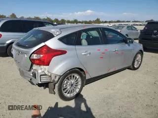 2014 Ford Focus Electric with VIN 1FADP3R45EL287285, listed as a Copart auction lot 74148154 with 64,543 mi miles and Salvage title. Bid and sale history available at DreamBid. Image 3.