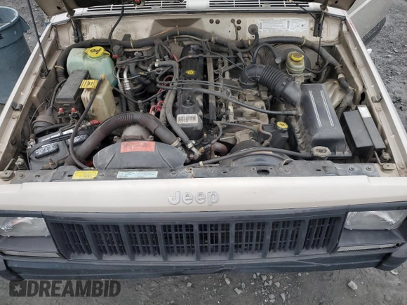 1996 Jeep Cherokee Sport with VIN 1J4FJ68S6TL112962, listed as a Copart auction lot 41540935 with 234,458 mi miles and Salvage Title. Bid and sale history available at carsss.com. Image 12.