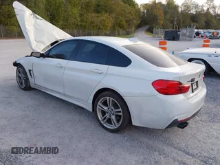 2015 BMW 4 Series 428i xDrive z VIN WBA4C9C57FD330866, wystawiony jako IAAI lot #40574326 z przebiegiem 123 726 mil mil oraz . Historia ofert i sprzedaży dostępna na DreamBid. Obrazek 3.