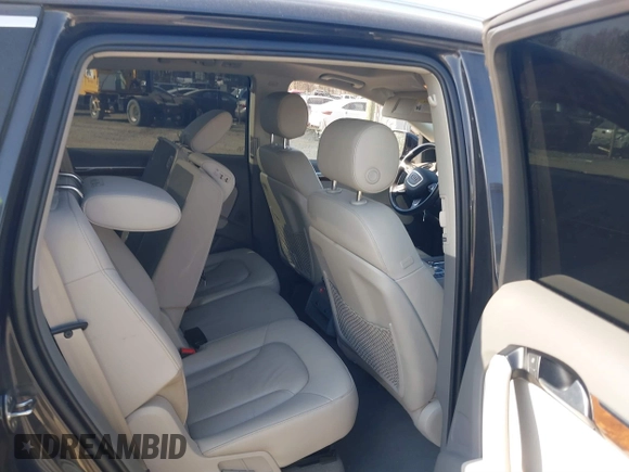 2014 Audi Q7 Premium Plus with VIN WA1LGAFE9ED001319, listed as a IAAI auction lot 41775171 with 144,711 mi miles and . Bid and sale history available at DreamBid. Image 8.