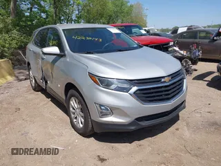 2018 Chevrolet Equinox LT z VIN 2GNAXJEV5J6309683, wystawiony jako IAAI lot #42238143 z przebiegiem 77 164 mil mil oraz . Historia ofert i sprzedaży dostępna na DreamBid. Obrazek 1.